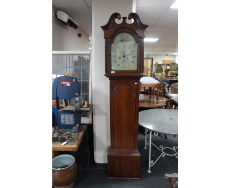A nineteenth century oak longcased clock with painted dial by Peter Gill, Aberdeen