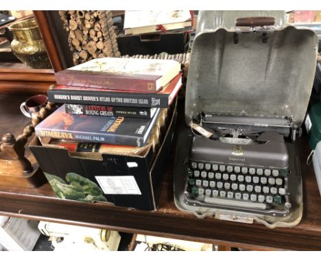 A vintage imperial typewriter in case together with a box of books, book of knowledge, Victorian photograph album etc 