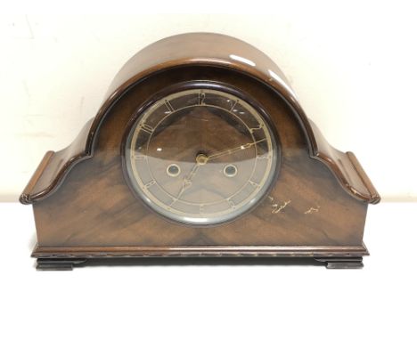 A 1930's walnut eight day mantel clock