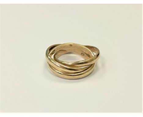 A 9ct gold triple band ring, size U.  CONDITION REPORT: 9.8g