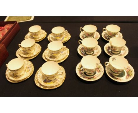 TEA WARE TRIOS. Six Colclough tea ware trios and six Royal Albert cups and saucers
