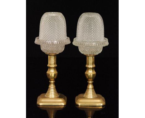 A pair of late 19th Century pressed flint glass Fairy Night Light domes with a strawberry diamond pattern with matched Clarke