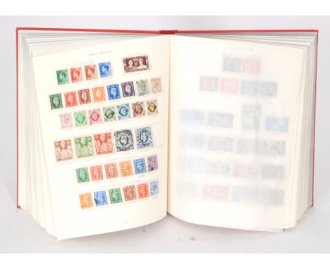 A King George VI stamp album to include British, Commonwealth, Falkland stamps and others, mint, cancelled and over stamped e