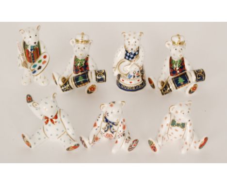 Seven assorted small Royal Crown Derby teddy bear paperweights to include two holding Christmas crackers, one titled Claude h