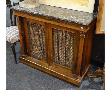 A Victorian rosewood veneered credenza, with a later associated marble top over brass lattice panel doors flanked by column s