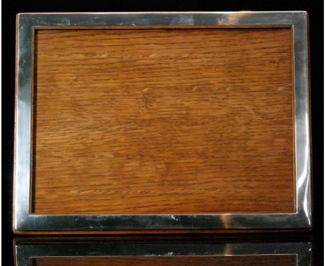 A George VI hallmarked silver mounted easel photograph frame of plain rectangular outline, width 27cm, London 1935, makers ma
