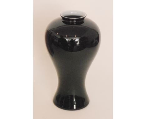 A contemporary Italian Murano glass vase by C. Nason, of inverted baluster form cased in a black over an opal interior, acid 