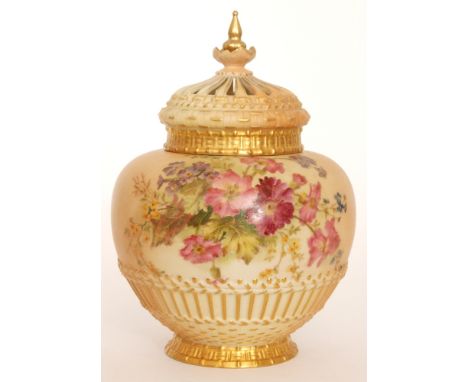 A large Royal Worcester blush ivory shape 1286 pot pourri and spire cover decorated with sprays of summer flowers above a mou