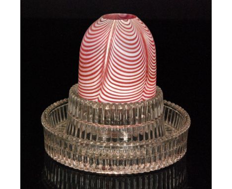 A late 19th Century Stourbridge Fairy Night Light with a ruby dome decorated with fine white pulled thread, raised to a Clark