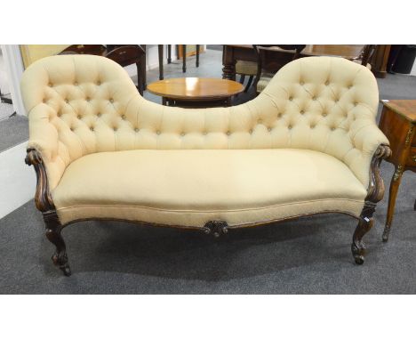 A Victorian carved walnut double spoon back chaise longue upholstered in cream damask on cabriole legs to the front, length 1