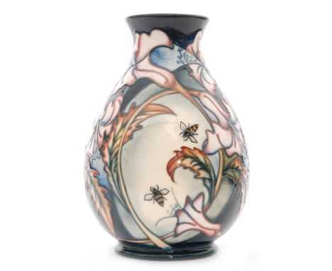 A large Moorcroft Pottery vase of footed form known as the 'Absentee Pot' designed by Sian Leeper, signed to the base and num