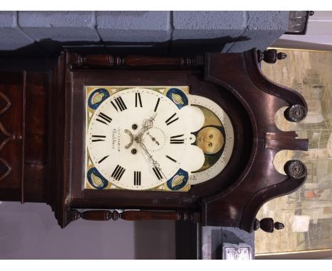 A mid 19th Century mahogany longcase clock, the arch painted dial with moon phase and eight day striking movement signed Thos