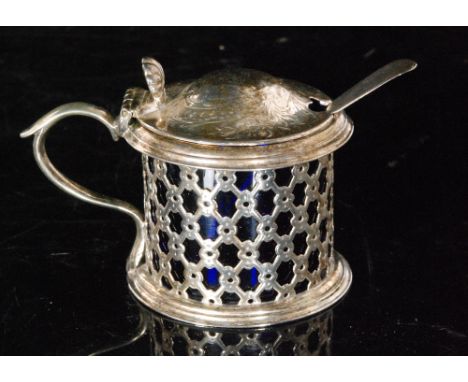 A Victorian hallmarked silver preserve pot and hinged cover, the drum shaped body with a pierced trellis pattern showing the 