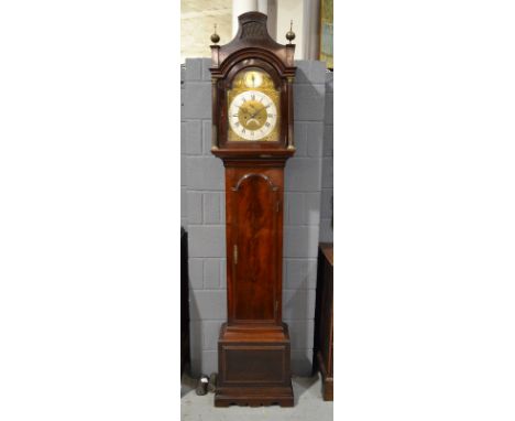 A 19th Century mahogany longcase clock, the 12 inch brass broken arch dial with silvered chapter ring, subsidiary seconds dia