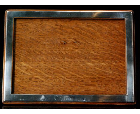 A hallmarked silver plain rectangular easel back photograph frame, Birmingham 1945, Charles S Green & Co Ltd, and another sma