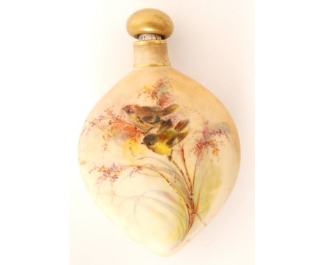 A late 19th Century shield shaped scent bottle, the blush ivory ground decorated with two hand painted birds perched on a bra