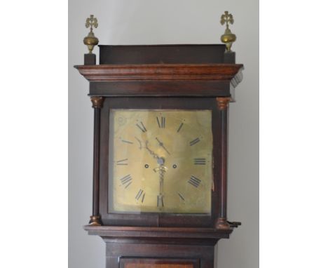 An early brass eight day long case clock movement by John Skinner Exeter with seconds and date aperture, later case enclosed 