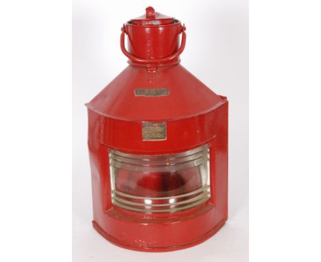 A late 19th and early 20th Century red painted bulkhead ships Port lantern named 'The Meteorite', height 58cm