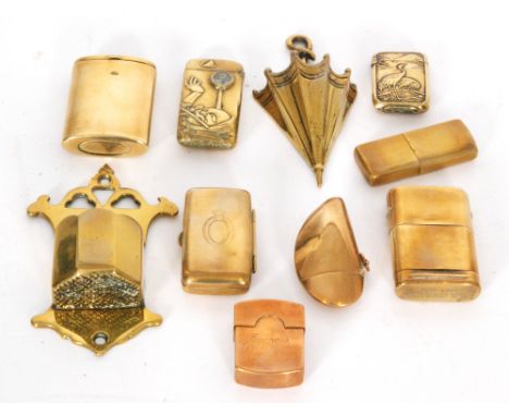 Ten assorted late 19th and 20th Century brass vesta cases and cigarette lighters to include a rectangular vesta with an inset