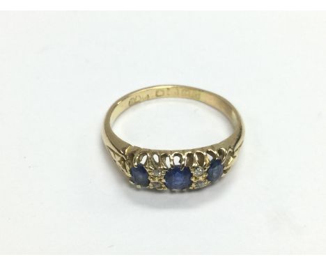 An 18ct gold, sapphire and diamond ring, approx 3g and approx size K. Shipping category A.