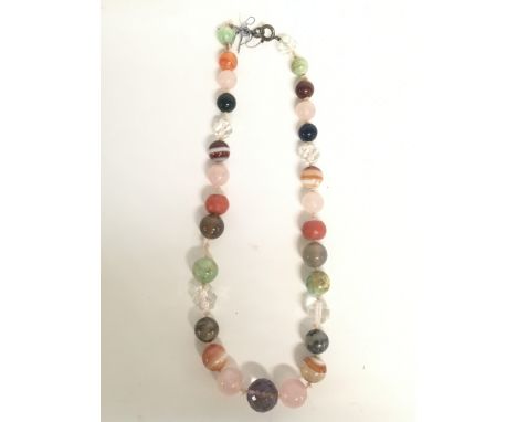 Antique beads including jade, coral, agate, quartz etc. postage cat A