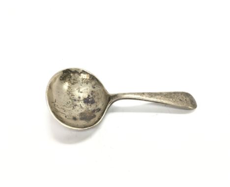 A silver caddy spoon. 17.48g and 8cm