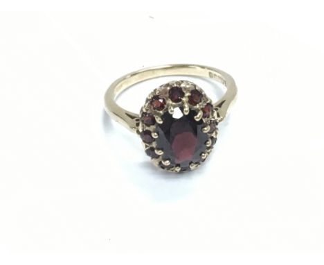 A 9ct gold ruby ring. Size L and 3.14g Postage A