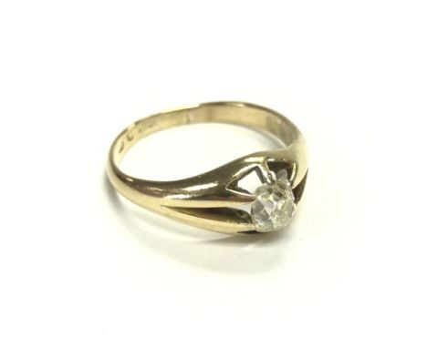 An 18ct gold gents ring set with diamond. 5.13g and size S. Postage B