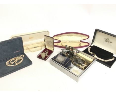 A collection of jewellery including pearl necklaces, a silver hallmarked dog tag, a Conway Stewart 14ct gold tipped pen, a 9c