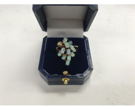 A 14ct gold Opal and diamond. Approx weight