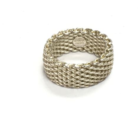 A Tiffany and Co silver ring. Size O.