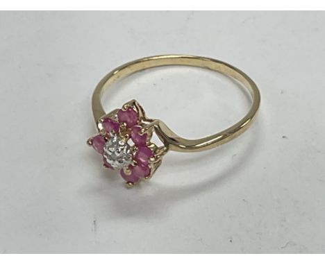 9ct yellow gold ruby and diamond dress ring. R/C rubies 0.30ct approx. Ring size M/N. Postage category A.