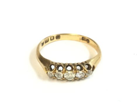 An 18ct 5 stone diamond rose cut ring. 3.20g and size Size O. Postage A