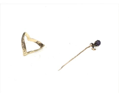 A 9ct pin and a 9ct ring size approx P and 3.82g Postage B
