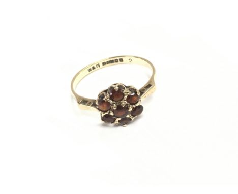 A 9ct gold ruby ring. Size O and 1.90g. Postage A