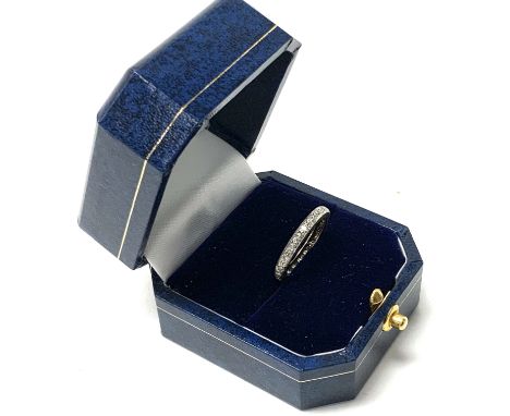A white gold and diamond set full eternity ring, (A)