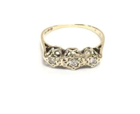 A 9ct gold ring set with three diamonds. Size N and 2.05g Postage A