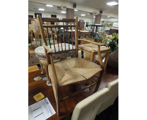 A WICKER SEAT ARMCHAIR, TWO STOOLS (3)