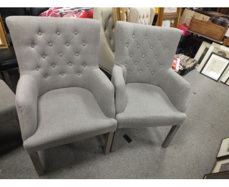 A PAIR OF MODERN UPHOLSTERED BUTTON BACK ARMCHAIRS (2)