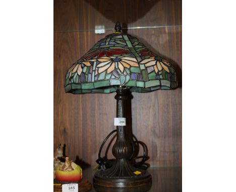 A TIFFANY STYLE TABLE LAMP WITH FLORAL GLASS SHADE 