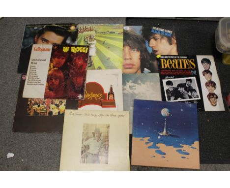 A COLLECTION OF LP RECORDS TO INCLUDE THE ROLLING STONES, THE TROGGS, ELO ETC. 