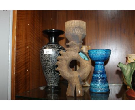 A CLIVE BROOKER STUDIO POTTERY VASE, TOGETHER WITH AN ETCHED STONE VASE, STUDIO POTTERY CANDLE STICK AND AN ONYX VASE (4)