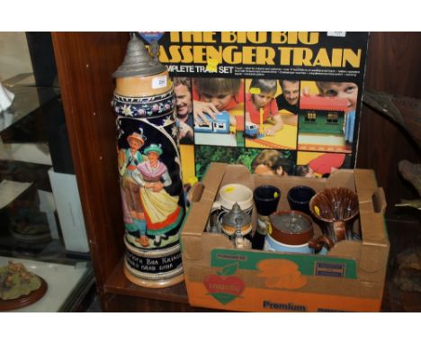 A LARGE CERAMIC GERMAN BEER STEIN TOGETHER WITH THREE SMALLER EXAMPLES AND A SMALL QUANTITY OF CERAMICS TO INCLUDE A PAIR OF 