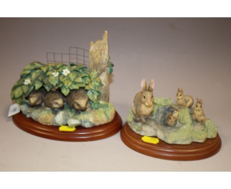 A BORDER FINE ARTS 'UNDERCOVER HEDGEHOG FAMILY' TOGETHER WITH A CHILTERN COLLECTION 'RABBIT FIGURE'