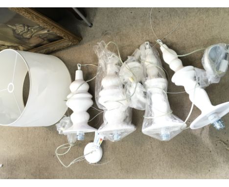 Four ceramic Karman hanging lamps and a large shade