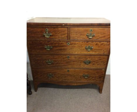 An Early Victorian mahogany chest of drawers the rectangular top above two short and three long drawers on bracket feet.