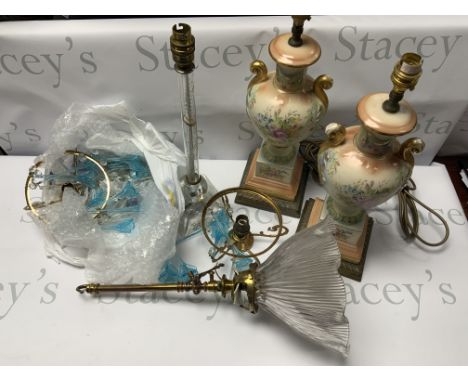 A collection of antique lamps and light fittings with modern electrical fittings. (D)