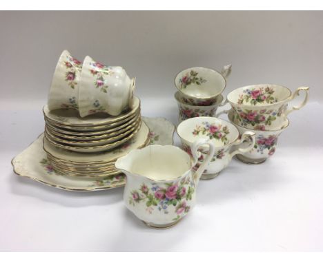 A Royal Albert tea service in Moss Rose pattern. Shipping category D.