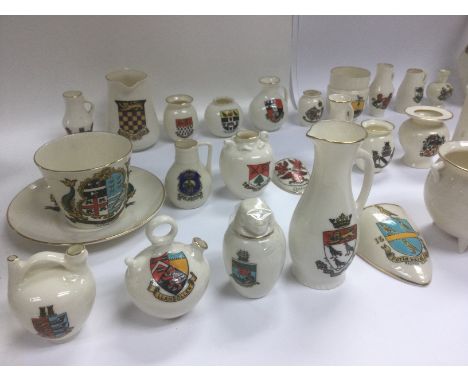 A collection of 45 items of WH Goss ware with various crests and model shapes .