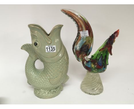 A mid 20th Century glass Murano Cockerel multi coloured glass no obvious damage and a large ceramic jug in the form of a fish